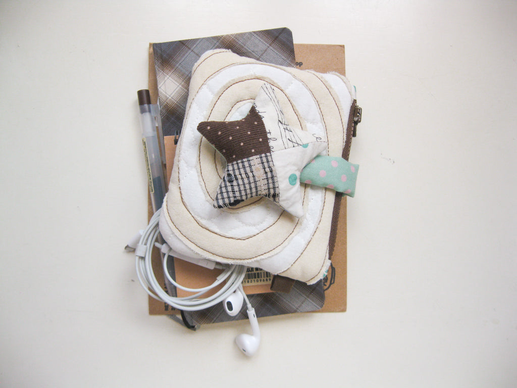 one of a kind puffy wallet (swirly star)